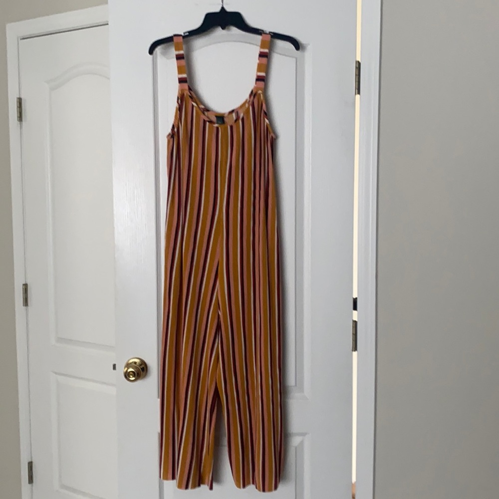 Striped jump suit.